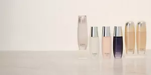 Group of Sensai Step 1 lotions next to each other on top of light gray glossy surface